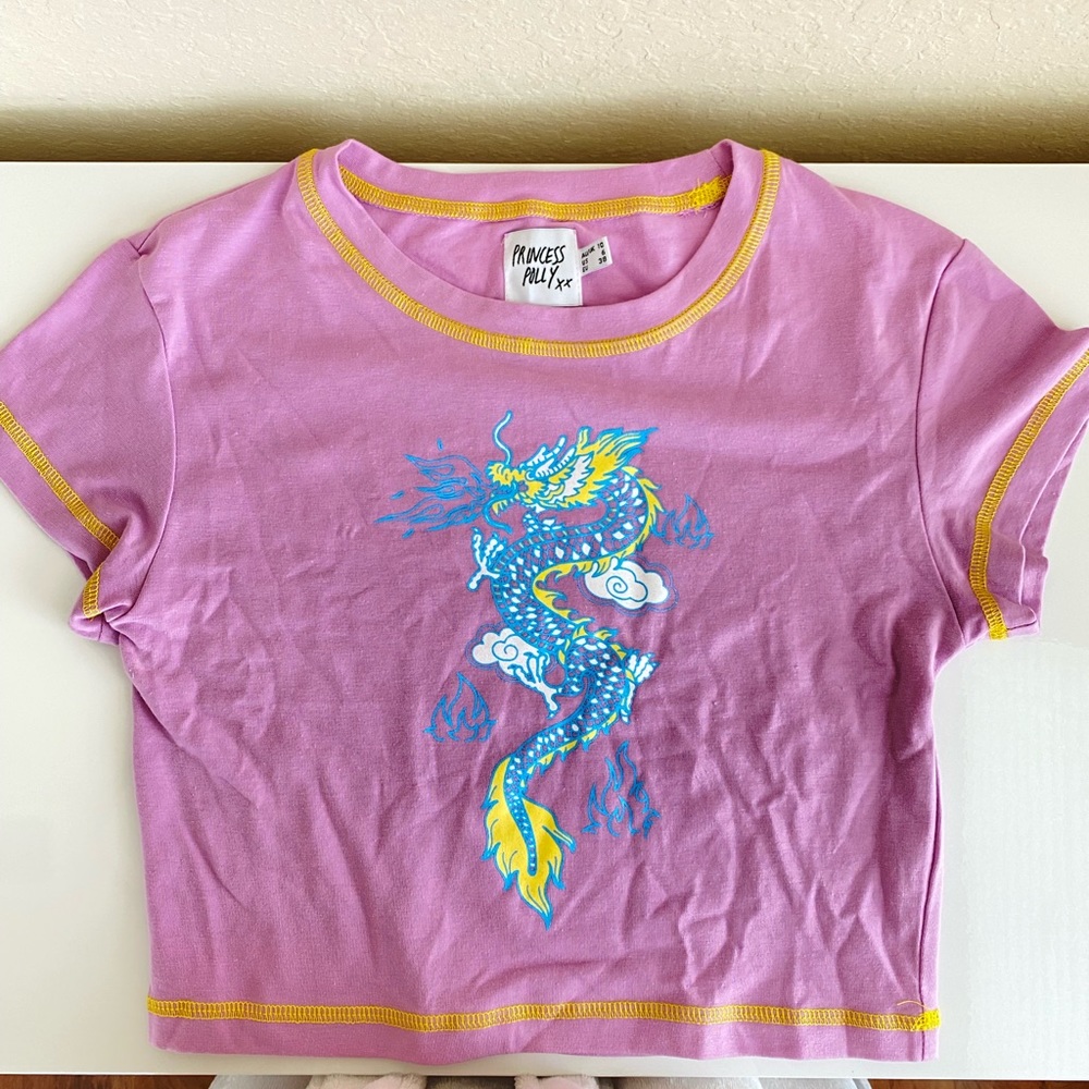 Princess Polly Pink Short Sleeve Dragon Graphic Tee with Yellow Trim